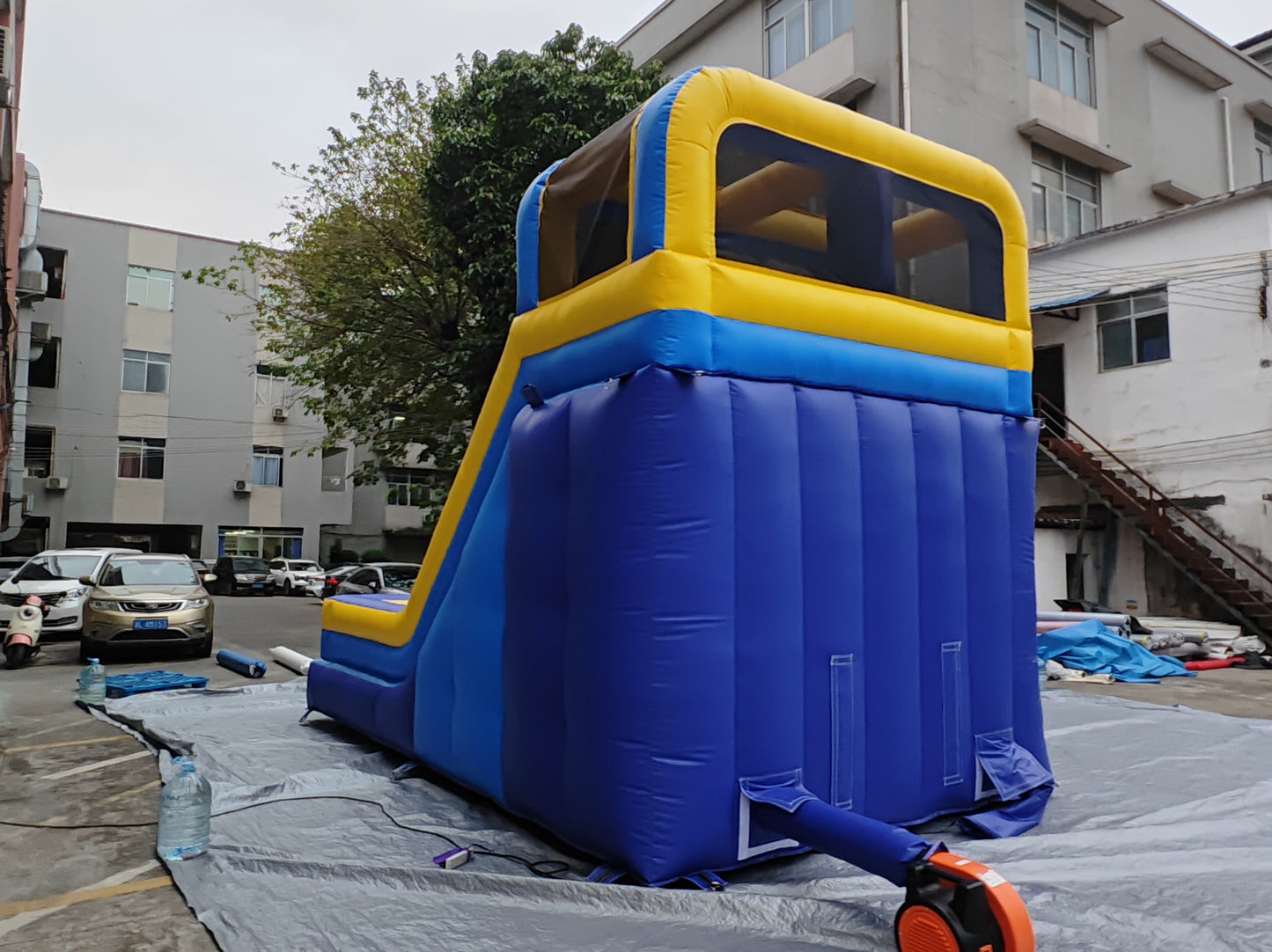 Commercial-Grade 9×6M Inflatable Bouncy Castle Combo with Slide & Blower — Blue & Yellow