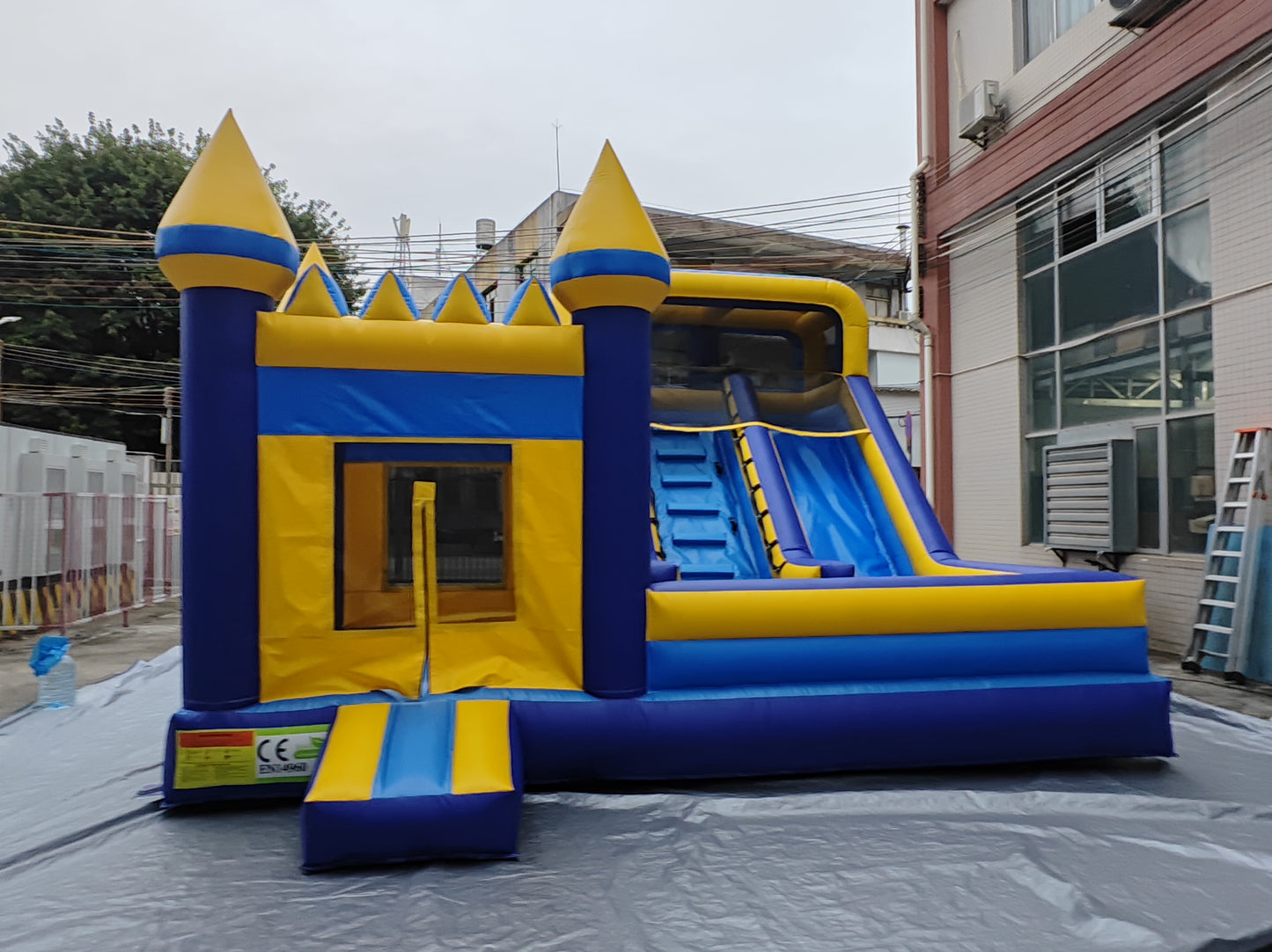 Commercial-Grade 9×6M Inflatable Bouncy Castle Combo with Slide & Blower — Blue & Yellow